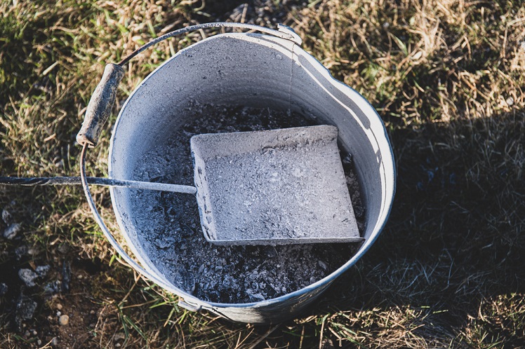 how to dispose of charcoal ashes